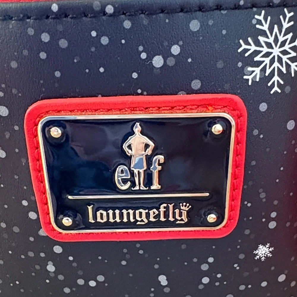 ELF Loungefly lights up!!! Festive Backpack with Clausometer Design